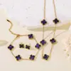 Acero de Titanio No se Desvanece Flor de Cuatro Hojas Doble Cara Set Collar para Mujer, Moderno y Elegante, Cadena Clavicular de Lujo Ligero Celebridad de Internet Pulsera Venta al por Mayor