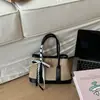 Versátil Bolso Pequeño Texturizado Estampado de Leopardo para Mujer 2026 Nuevo Bolso Cruzado Bolso de Mano Diario para Mujer Bolso Cubo Bolso de Hombro Único para Mujer