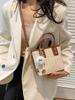A popular bolsa pequena tecida feminina 2024 verão nova bolsa portátil bolsa de palha para todos os fósforos bolsa de mensageiro de palha