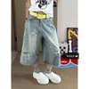 Shorts de mezclilla de tiro alto con diseño rasgado estilo americano para mujer, talla grande, nuevos de verano 2026, pantalones cropped anchos de corte holgado, modernos