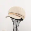 Otoño e invierno coreano etiqueta de cuero simple y única color sólido elegante exquisita para mujer gorra octagonal de pico de pato boina artística
