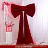 Decoración de sala de bodas lazo de terciopelo rojo adornos colgantes set de personajes felices pared de fondo decoración de alta gama etiqueta transfronteriza