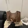 Bolsas Tote Retrô Europeias e Americanas para Mulheres Nova Coleção Primavera 2026 Bolsa de Ombro Grande para o Dia a Dia Bolsa de Mão para Trabalho Bolsa Grande Feminina de Ombro Único