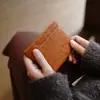 2025 Nuevo Cierre Automático Almacenamiento de Resorte Tesoro Portátil Mini Multifuncional Bolsa Pequeña para Artículos Varios Auriculares Llave