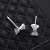 Moda coreana diseño de nicho simple aretes de lazo de plata esterlina S925 aretes plateados de temperamento con sentido de alta gama para mujer al por mayor