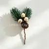 Suministro transfronterizo de Navidad: ramas de plantas artificiales, agujas de pino, ramas de flores, accesorios, decoraciones festivas, plantas artificiales, bayas rojas, ramas de frutas