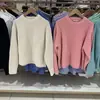 Probador 2023 Primavera Nuevo Estilo Suave Holgado Versátil Cuello Redondo Suéter de Punto de Manga Larga 454754