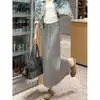 Falda casual para mujer estilo coreano, nuevo estilo deportivo de otoño, que cubre la cadera, corte recto holgado línea A adelgazante con abertura, falda ajustada