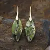 Nuevos pendientes colgantes de hojas de piedra natural bohemios europeos y americanos de moda, joyería retro de estación independiente transfronteriza.