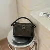 Bolso de mujer retro esmerilado de moda 2026 nuevo bolso cruzado versátil de moda para el trabajo bolso de mano otoño e invierno bolso cuadrado pequeño