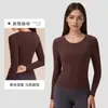 Nuevo top deportivo de manga larga para yoga de otoño para mujer, con tacto nude, corte ajustado y diseño de cuello redondo para fitness y ejercicio