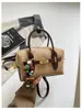 Bolso de mano Boston de gamuza vintage transfronterizo para mujer, nuevo bolso nicho de alta moda tipo almohada, bolso de hombro y bandolera