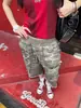 Pantalones Cortos Camuflaje Retro Americanos Originales del Fabricante para Hombres y Mujeres con Múltiples Bolsillos, Cintura Elástica con Cordón, Estilo Urbano Holgado, Largo de Siete Puntos, Ropa de Trabajo