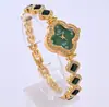 Relógio de Quartzo para Mulheres com Pulseira de Trevo de Quatro Folhas Esmeralda, Item de Venda Quente no Exterior para Atacado