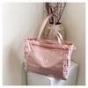 A popular bolsa de ombro transparente com laço de fita 2025, linda e grande capacidade de costura, da moda deste ano