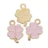 Colgante de trébol de cuatro hojas de la suerte multicolor de venta caliente transfronteriza con goteo de aceite Accesorios de joyería de aleación DIY Colgante de collar y pulsera