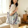 Bolsa de ombro com estampa floral para mulheres, bolsa tote de grande capacidade, bolsa de mão da moda estilo coreano, nova bolsa versátil de verão 2026, fábrica