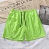2023 comercio exterior transfronterizo nuevos pantalones cortos de cinco puntos para hombre secado rápido color liso pantalones de playa jóvenes deportes fitness pantalones cortos de secado rápido