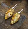 Nuevos pendientes colgantes de hojas de piedra natural bohemios europeos y americanos de moda, joyería retro de estación independiente transfronteriza.