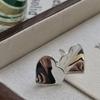 Pendientes de plata S925 con forma de corazón de melocotón brillante y diseño de nicho femenino, con diseño transfronterizo europeo y americano.