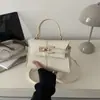 Bolsa trapezoidal nova transfronteiriça bolsa de mão moda para o trabalho bolsa feminina de mão bolsa simples de ombro único transversal bolsa feminina casual de axila