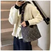 Bolsa de grande capacidade feminina 2024 novo estilo coreano nicho viajante arco faculdade estudante classe bolsa de ombro bolsa crossbody