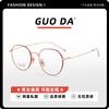 Lujo ligero pluma titanio estilo coreano estilo dorado retro armazón ovalado de titanio para gafas armazón de gafas soporte nasal de cerámica resistente al sudor Danyang gafas al por mayor
