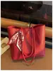 Bolsa Tote Popular para o Trajeto Matinal de Comércio Exterior Feminina Verão 2025 Grande Capacidade Tendência Moda Casual Versátil Bolsa de Ombro