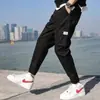 Pantalones Cargo para Hombre Primavera y Otoño 2021 Nuevo Estilo Sueltos Casuales Joggers Marca de Moda Pantalones Cropped Versión Coreana con Forro Polar