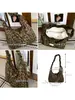 Nueva bolsa informal tipo dumpling de estilo coreano para otoño e invierno, estampado de leopardo vintage, bolsa de axila Y2K dulce y genial para ir al trabajo, bolso cruzado con cremallera