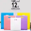 Bolsa de mano para ropa bolsa de regalo gruesa con remaches bolsa de cosméticos bolsa de embalaje con remaches hecha bolsa de plástico impresa con LOGOTIPO