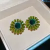 Pendientes de mariposa y flor de circón verde ultrabrillante transfronterizos, sensación de lujo ligero de alta gama, pendientes versátiles con un diseño único