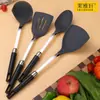 Espátula de silicona de grado alimenticio de acero inoxidable 304 resistente a altas temperaturas espátula para el hogar cuchara para sopa pala para freír con fugas grandes juego de cinco piezas para utensilios de cocina