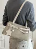 Bolsa de ombro estilosa estilo moto para mulheres, novo modelo 2026, bolsa de mão para o dia a dia, pequena bolsa tote para sair para o trabalho, bolsa baguette