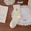 Calcetines de media pantorrilla para mujer con diseño de gatito KT, estilo japonés a bloques de color, dulces y lindos, estilo preppy, versátiles, tejido de ochos, calcetines holgados, algodón