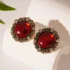 Pendientes de aguja plateada con lazo rojo Ankola, pendientes de estilo retro con temperamento, pendientes de estilo Hong Kong de alta gama al por mayor