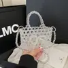 Bolsa de Mão Nova 2025 Feita à Mão com Contas para Mulheres Transparente Metálica Design de Nicho Bolsa Transversal Estilo Ins Bolsa de Festa