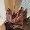 Bolsa Retrô de Grande Capacidade Transfronteiriça para Mulheres Novo Estilo Outono e Inverno 2026 Bolsa de Ombro Tote Versátil e Fashionável Bolsa Transversal