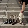 Botas de montaria retas femininas de couro bovino + tecido, novo modelo outono e inverno, bico redondo de couro genuíno com fivela e color-blocking, botas longas femininas