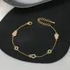 Transmisión en Vivo de Douyin Venta Caliente Joyería de Mano de Trébol de Cuatro Hojas Pulsera de Amor Camelia de Gama Alta para Mujer Pulsera Estilo Commuter Venta al por Mayor