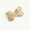 Broche de trébol de cuatro hojas de lujo con diamantes, pequeño pasador de aleación para trajes de mujer, chaquetas, cárdigans y decoraciones de cuello