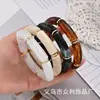Accesorio transfronterizo de gran venta, producto nuevo: brazalete abierto de forma de ola irregular para mujer, conjunto de tres piezas personalizado y de moda de joyería para mujer