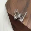 Botones de mariposa de lujo con circón microincrustado para mujer, abrigo, cárdigan, suéter, cheongsam, joyería chapada en cobre.