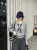 2026 Principios de Otoño Nuevo Estilo Cuello Polo Rayas Bufanda de Seda Tejido Estilo Universitario Top de Manga Larga Suave Favorecedor Versátil Mujer