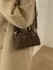 Bolsa de Mão Simples e Estilosa Estilo Coreano Bolsa Baguete para Mulheres 2026 Inverno Nova Retro Estilosa Versátil Bolsa de Ombro Transversal