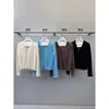 COMOS CMS 2026 Otoño Minimalista Cuello en V Malla Diamante Tejido Calado Cárdigan Top para Mujer 260085