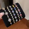 Pulsera tipo jaladera con colgante redondo de circón de colores, pulsera de lujo ligero, sensación de alta gama, pulsera de temperamento lujoso, pulsera versátil, venta al por mayor
