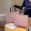 Loja de roupas de celebridade da internet bolsa de mão não tecido logotipo personalizado roupas compras presente bolsa atacado