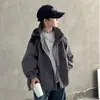 Nuevo cortavientos con capucha de bloques de color para otoño y primavera para niños, elegante y de corte holgado, adecuado para niños mayores, y diseñado para actividades al aire libre, ofreciendo protección contra el viento y una estética de ropa de trabajo.
