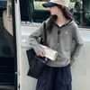 Conjunto de otoño moderno para niñas: un elegante conjunto de dos piezas que incluye una sudadera con capucha y pantalones de pierna ancha, perfecto para niñas mayores y niños, en un estilo de inspiración coreana